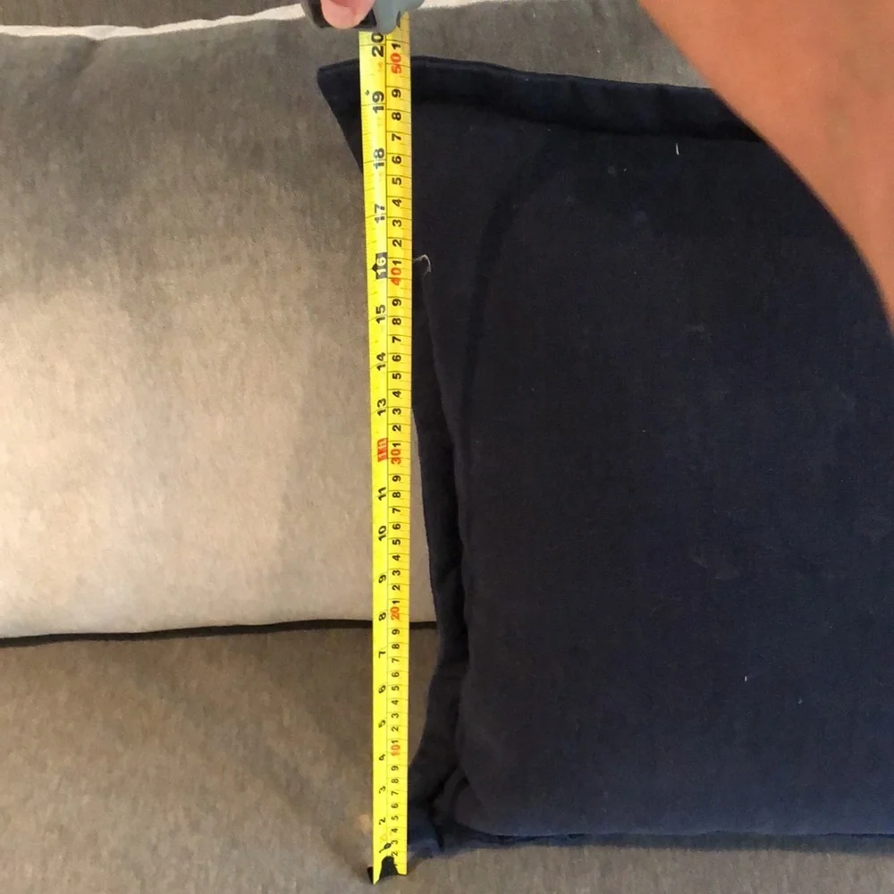 Navy down filled pillow with down insert. Approximately 20 x 20 edge to edge